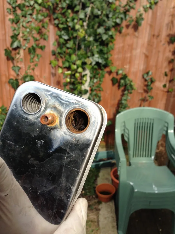 Boiler heat exchanger removed for repair