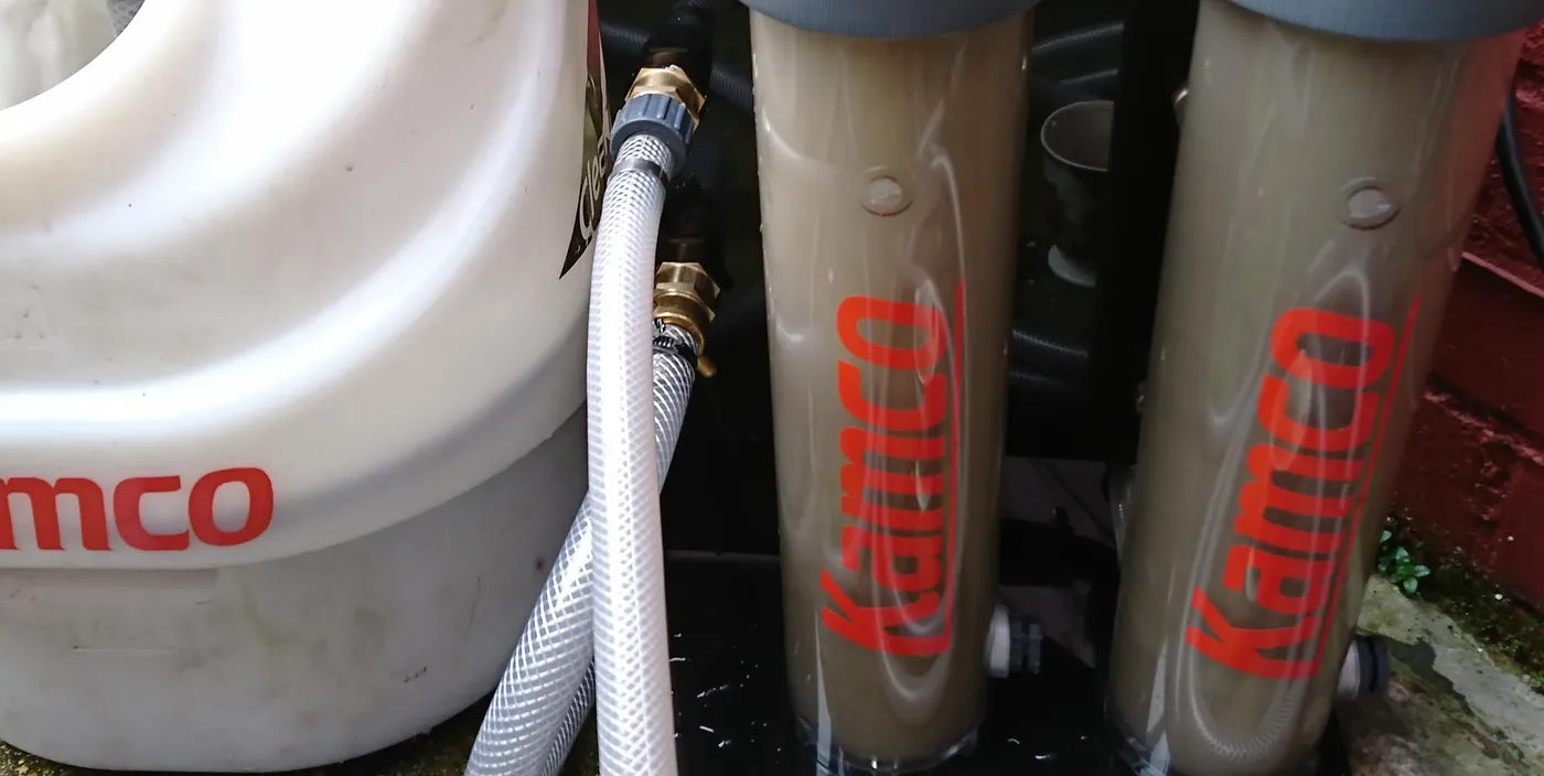 Kamco power flush filters removing dirty water from a heating system