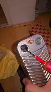 Blocked plate heat exchanger removed from a boiler