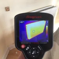 Thermal image of the same radiator after power flushing, evenly hot